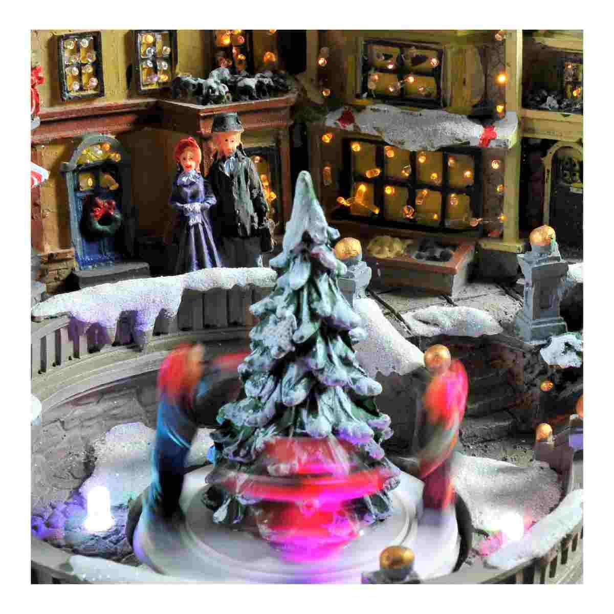 Giostra Natale Villaggio con Luci Suoni e Movimento cm.28x24